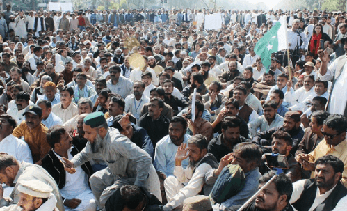 USC workers protest dismissals of 2,600 employees in Islamabad