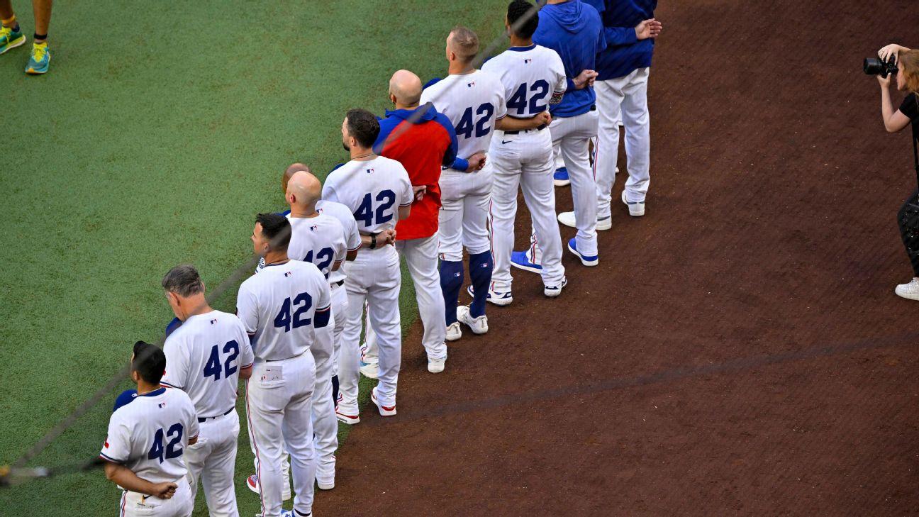 MLB honors Robinson: 'Keeping his legacy burning'