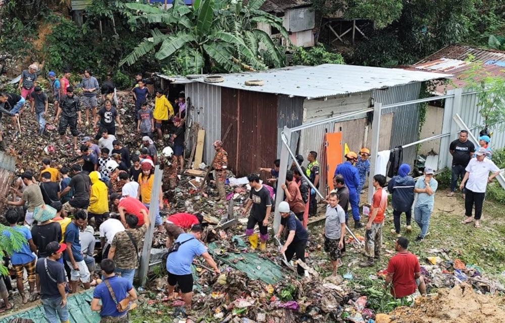 Twelve killed in Malaysia landslides after week-long downpour