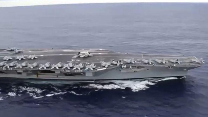 US deploys aircraft carrier as Iran warns against attack