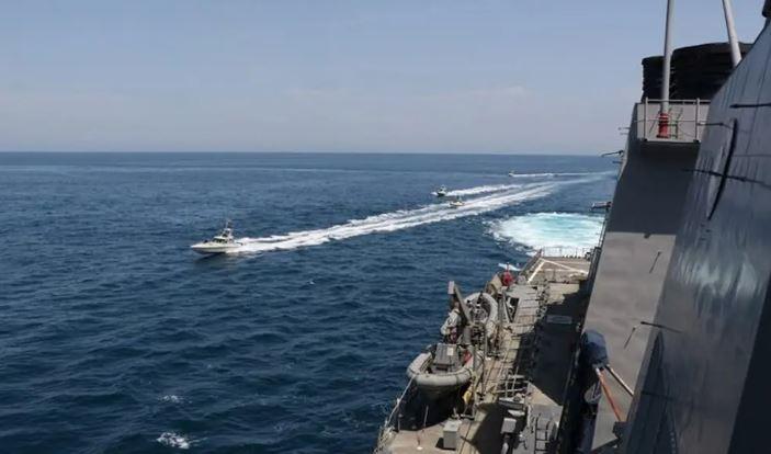 Iran says it fired warning missiles and drones at US warships in Gulf of Oman