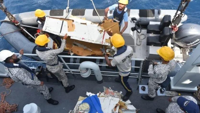 Families of crew aboard crashed cargo plane face agonising wait