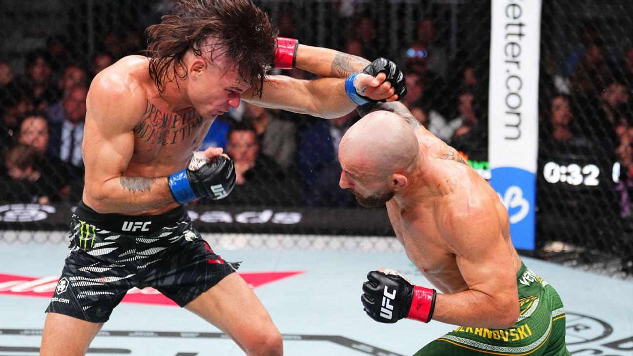 Volkanovski wins vacant title in slugfest with Lopes