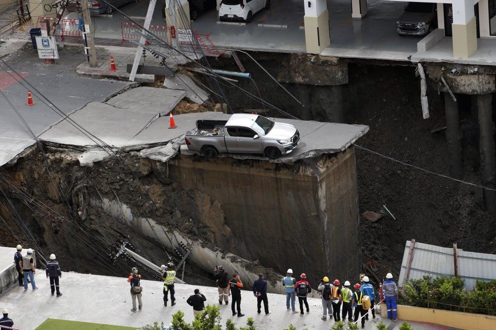 Bangkok road collapses near hospital, 50-meter-wide sinkhole emerges